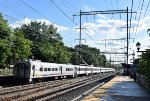 Comet V leading an eastbound NJT Train into Metuchen Depot